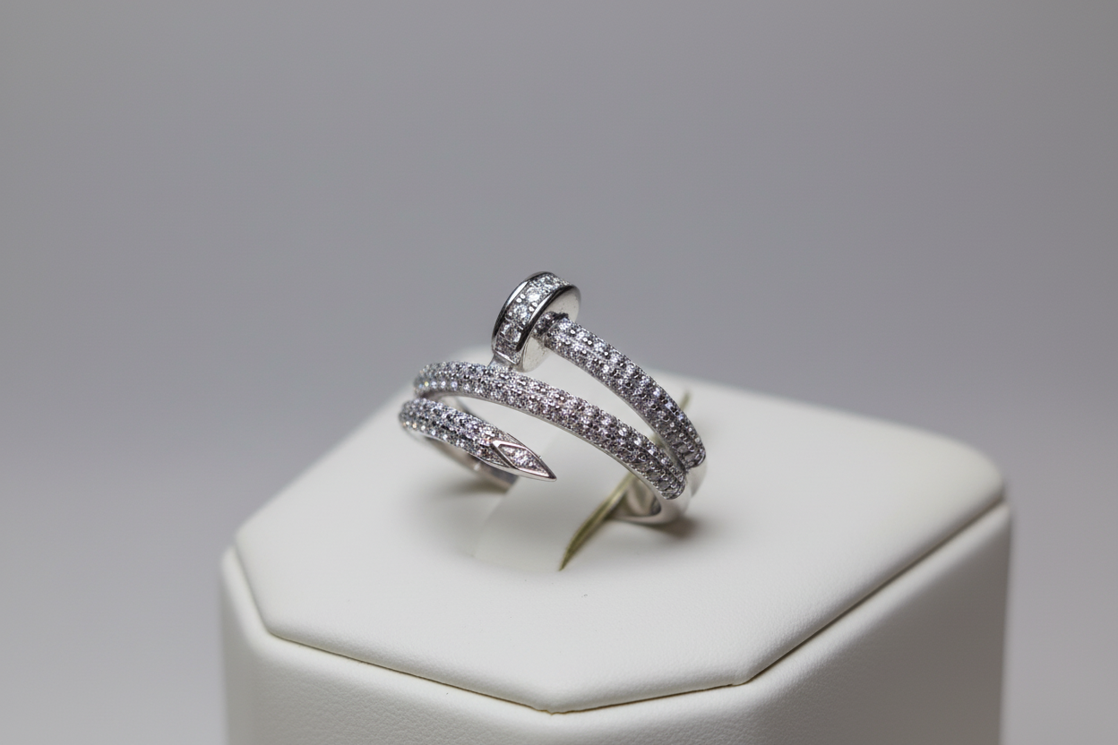 ANILLO DE PLATA 925 FORMA DE CLAVO DOBLE VUELTA