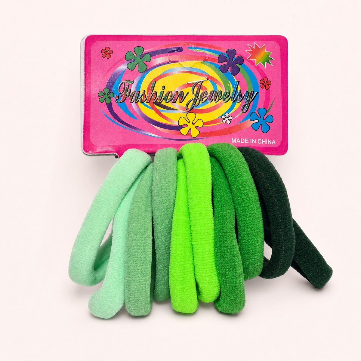 Set de 10 ligas para cabello Accesorios by Alexsa en tonos degradados de verde, elásticas y resistentes.