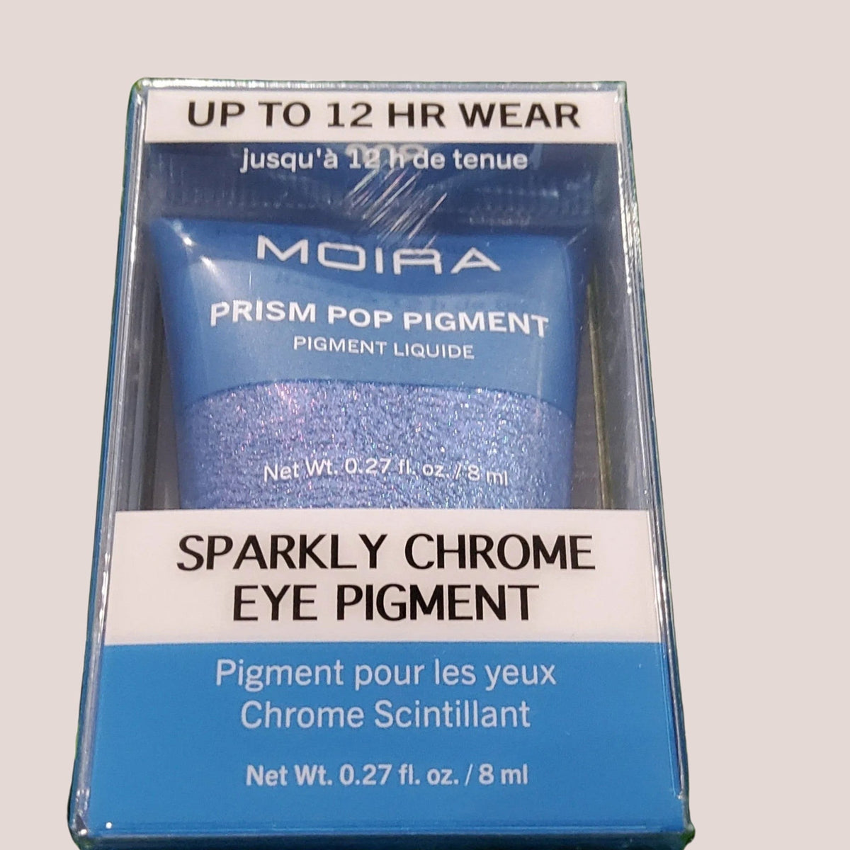 Accesorios by Alexsa Moira Sombra Prism Pop Pigment in a blue sparkly chrome liquid eye shadow tube packaging.
