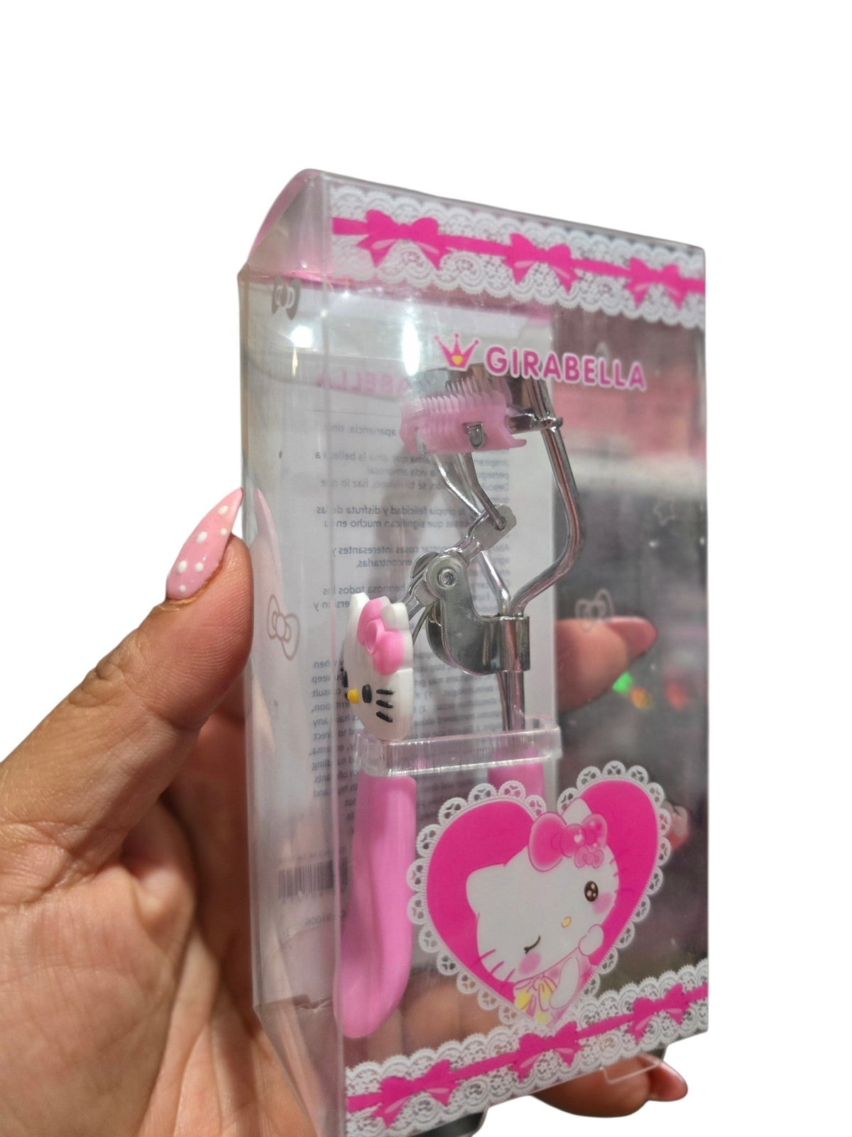 Accesorios by Alexsa pink Hello Kitty eyelash curler with integrated comb in clear retail packaging
