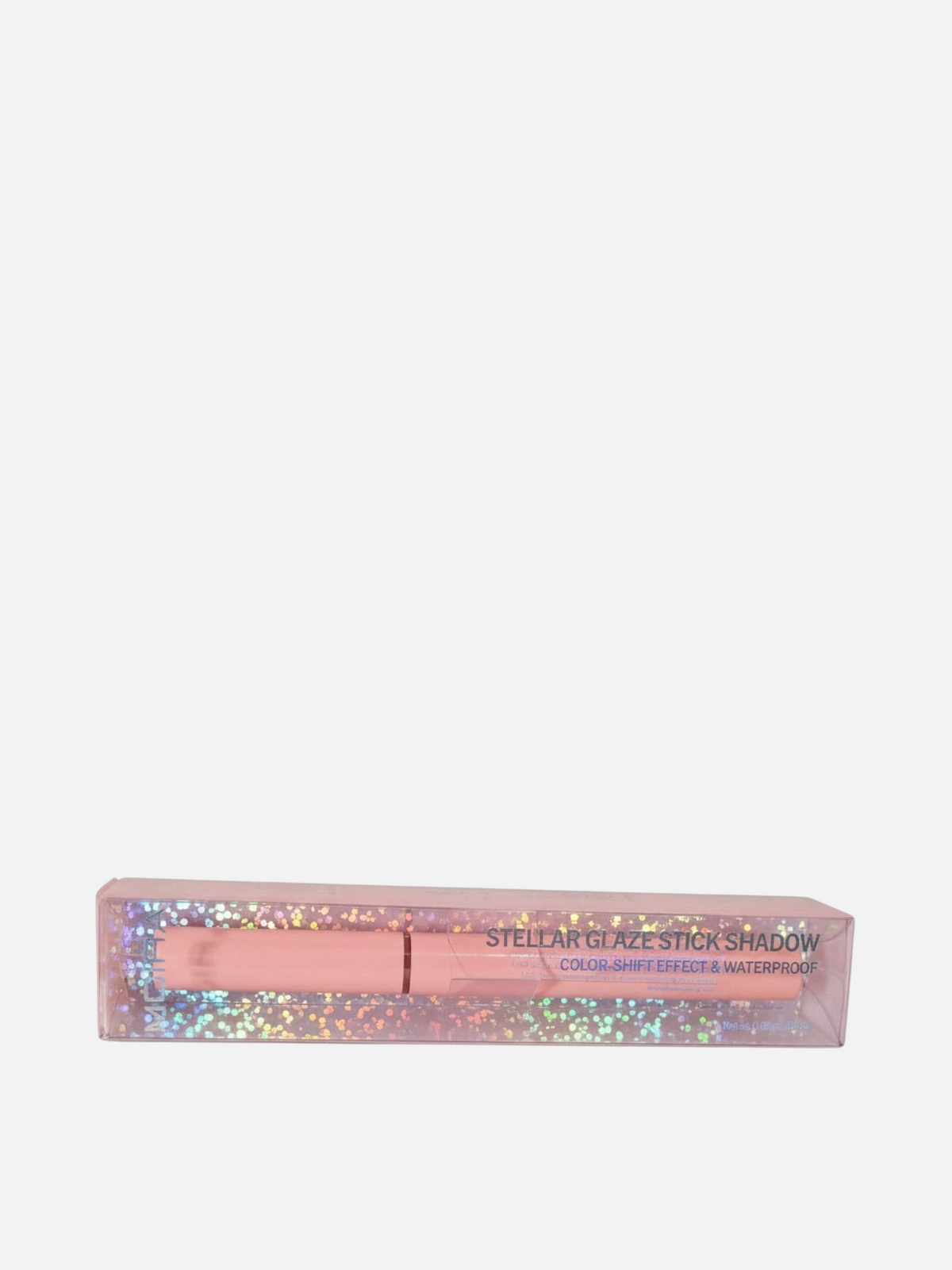 Sombra en barra MOIRA Stellar Glaze de Accesorios by Alexsa en empaque rosa brillante con efecto tornasol.