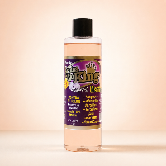 Aceite corporal de árnica y ajo King sobre fondo rosa nude, blanco y beige