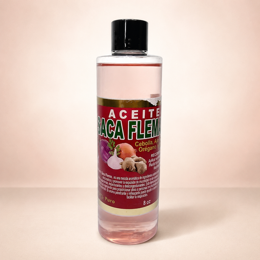 Aceite corporal Saca Flema sobre fondo rosa nude, blanco y beige