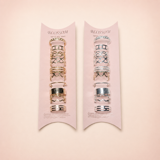 Anillos Ajustables para el Pie sobre fondo rosa nude, blanco y beige