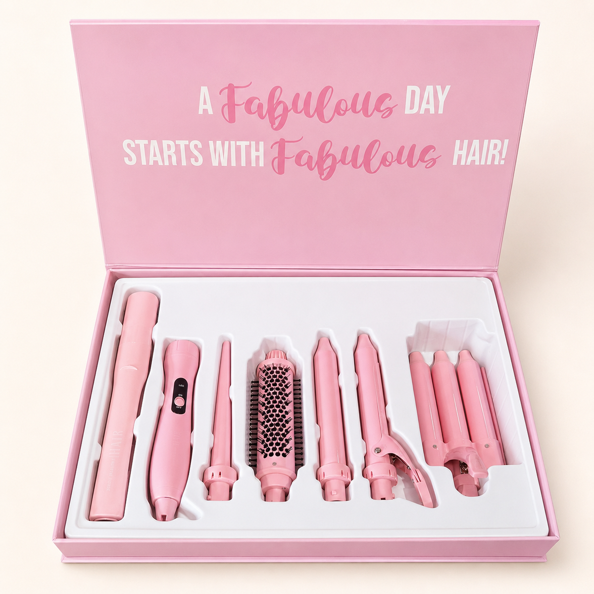 Beauty Creations 5 in 1 Hair Multitasker en fondo rosa nude, blanco y beige