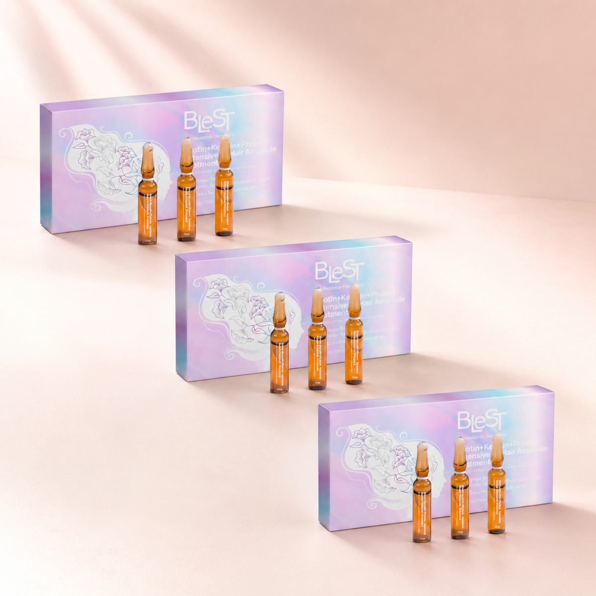 Presentación múltiple Blest Biotin+ en fondo rosa nude, blanco y beige