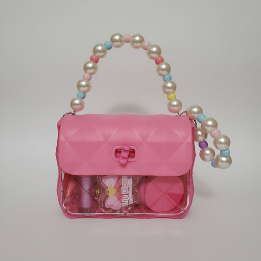 Bolso de niña con maquillaje