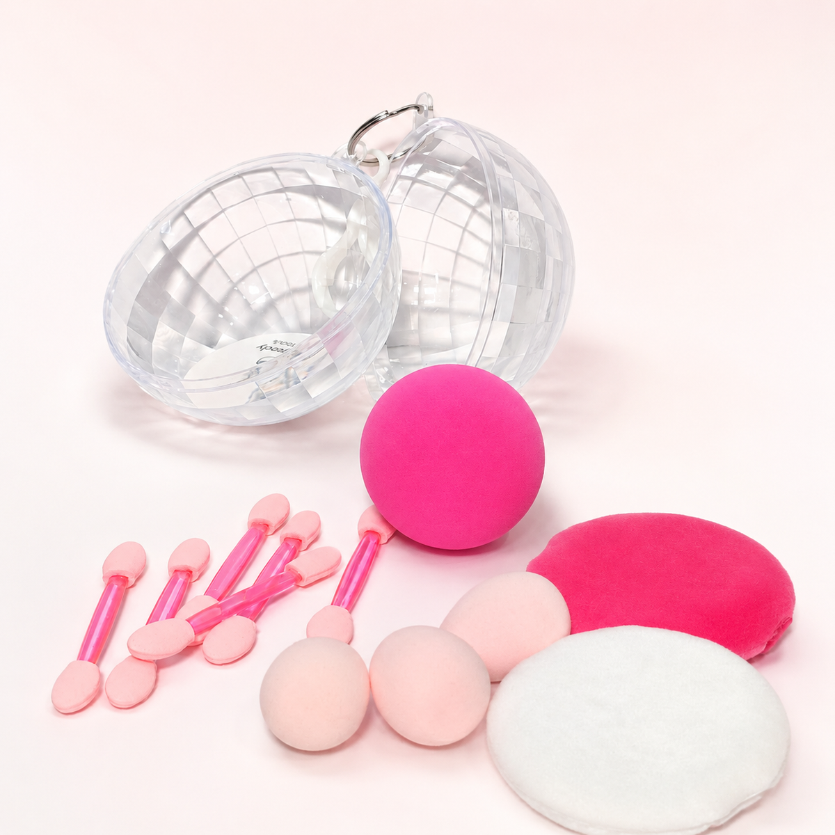 Set de esponjas y aplicadores dentro de esfera transparente